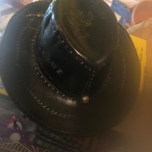 Black leather, hand tooled hat